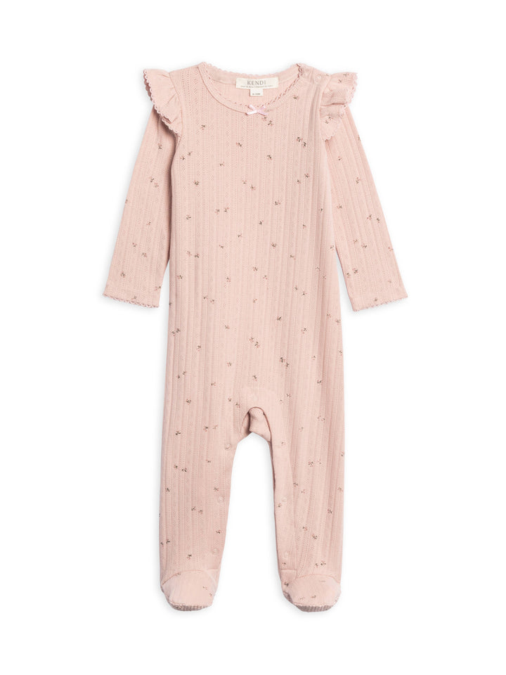 Pink with flowers baby onesie with ruffled shoulders on a white background