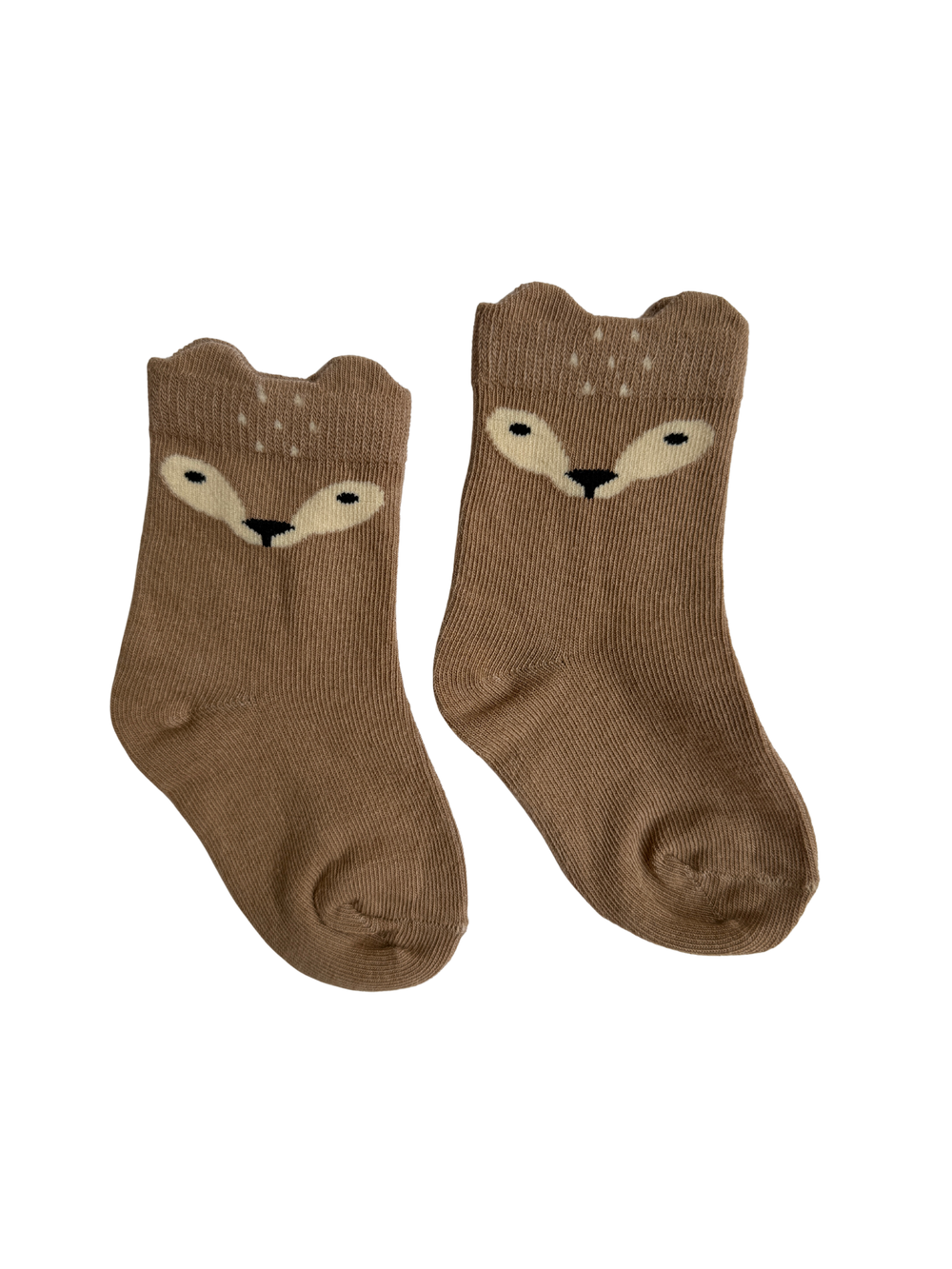Pair of brown socks with deer face design on a white background