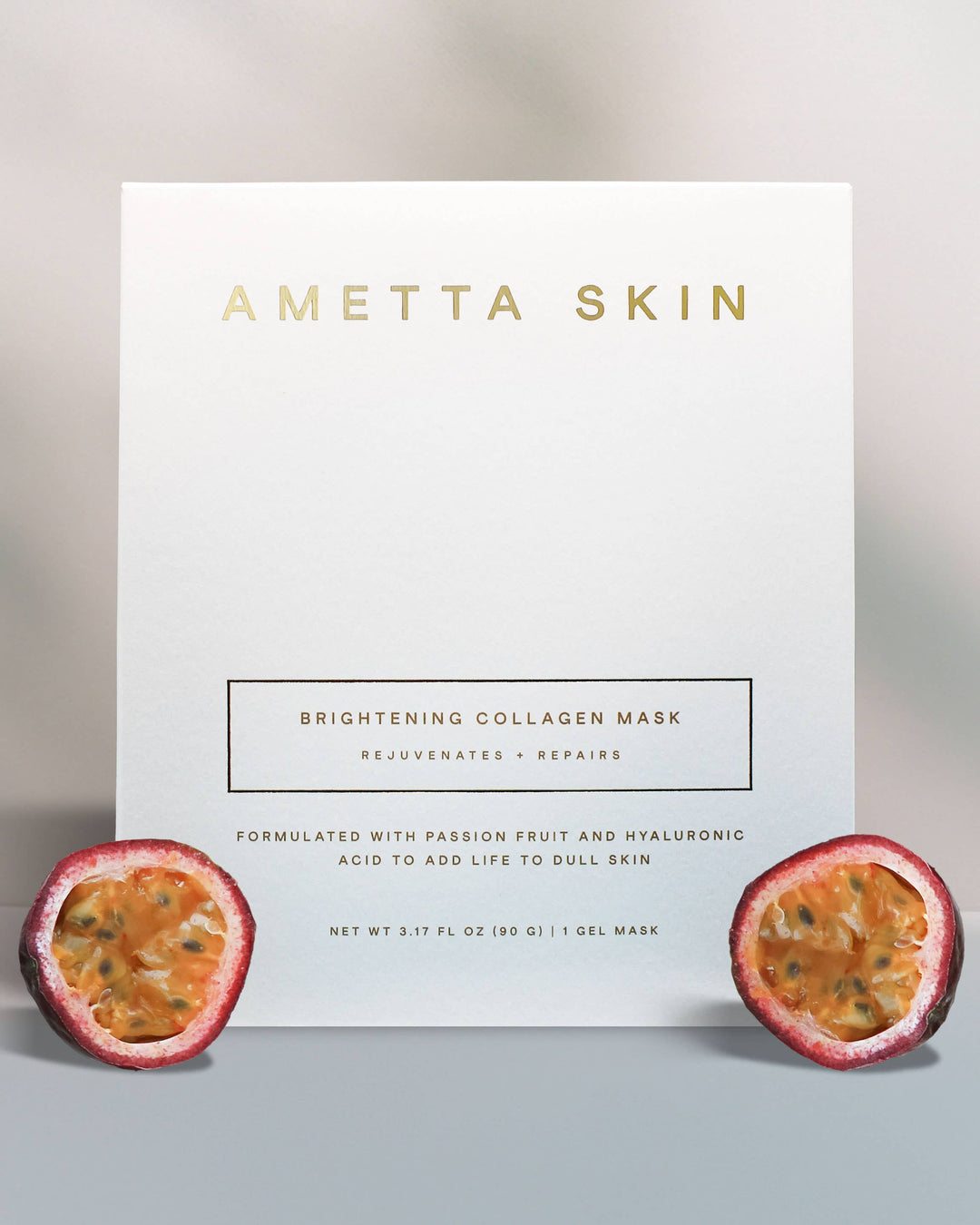 Ametta Skin brightening collagen mask packaging with passion fruit on a light gray background