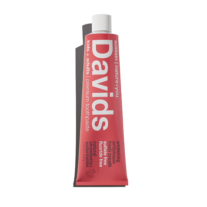 Red toothpaste tube with 'Davids' branding on a white background