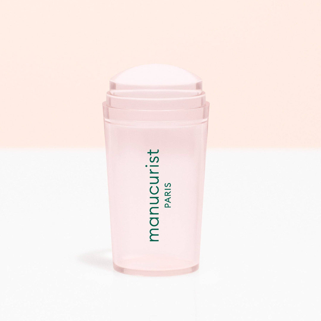 Manucurist Paris nail stamper on a light pink background