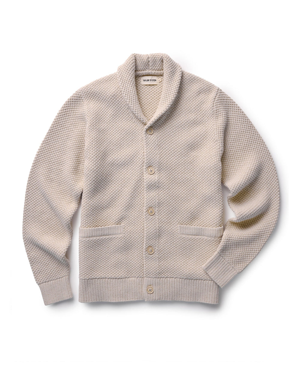 Beige cardigan on a white background