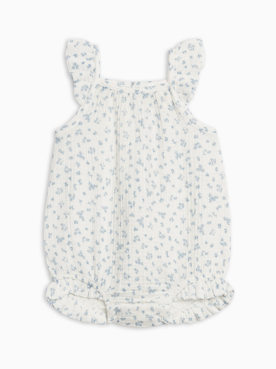 Baby romper with floral pattern on a white background