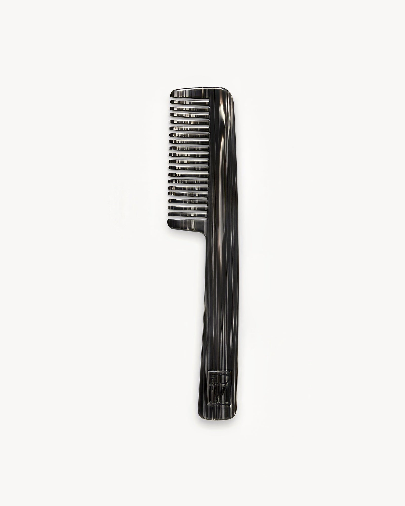 Black Pearl-patterned handle comb on a white background