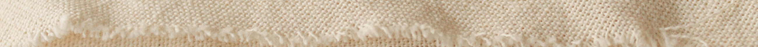 Textured beige background with a subtle pattern