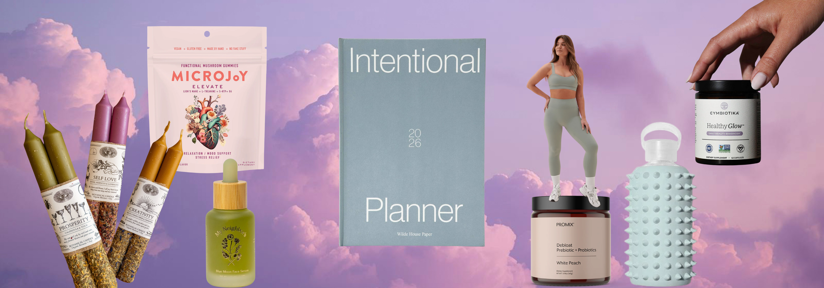 Collage of wellness products and a planner with a purple sky background
