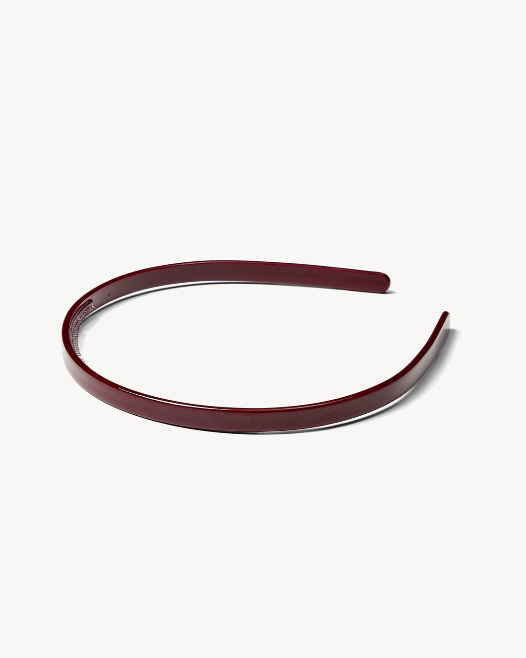 Ultralight Thin Headband in oxblood on a white background