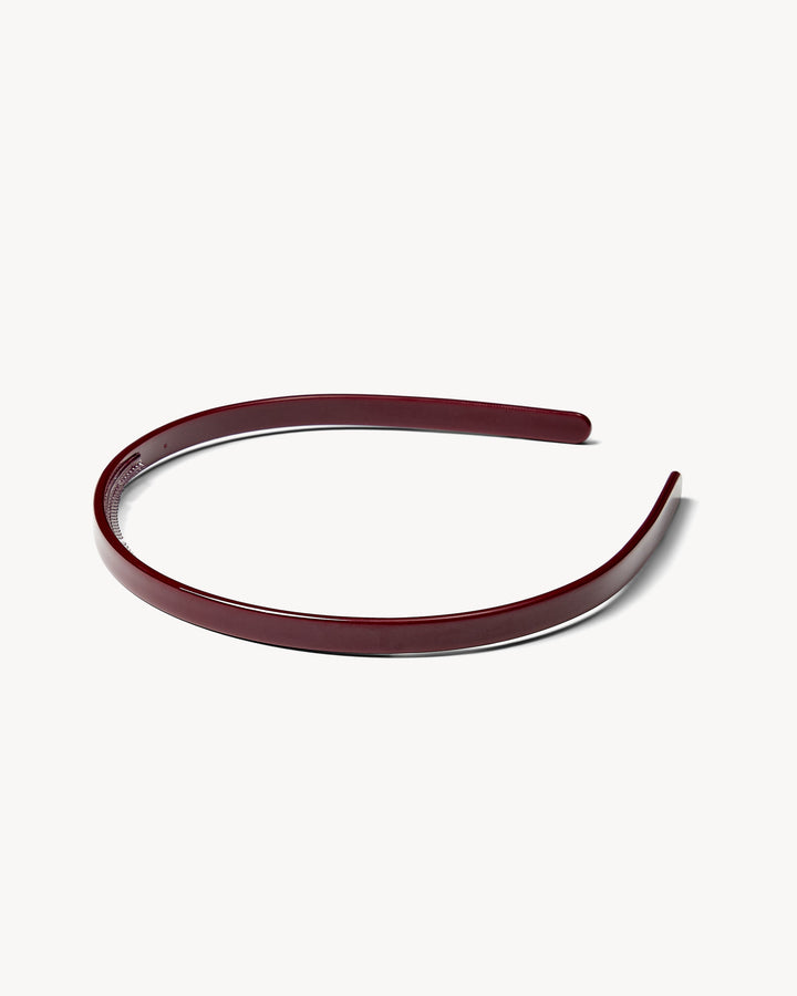 Ultralight Thin Headband in oxblood on a white background