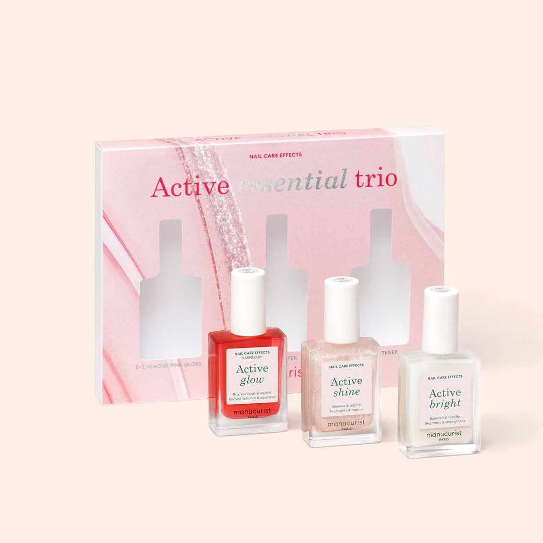 Three nail polish bottles with a packaging box labeled &
