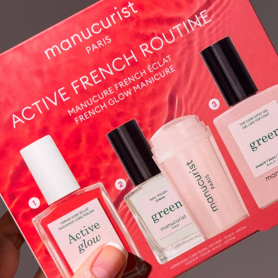 Manucurist Paris nail polish set with red packaging and nail polish bottles on a dark background