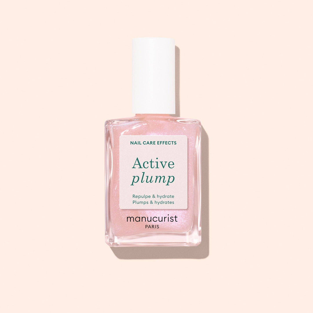 Pink nail polish bottle with &
