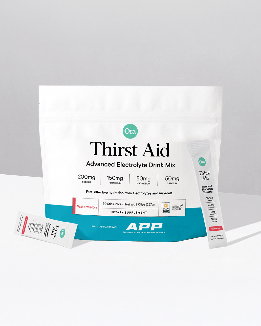 Ora Thirst Aid Advanced Electrolyte Drink Mix package on a gray background
