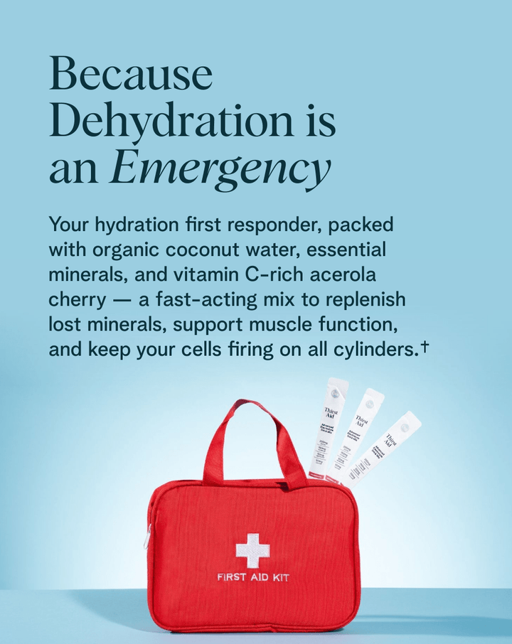 Red first aid kit with hydration products on a light blue background