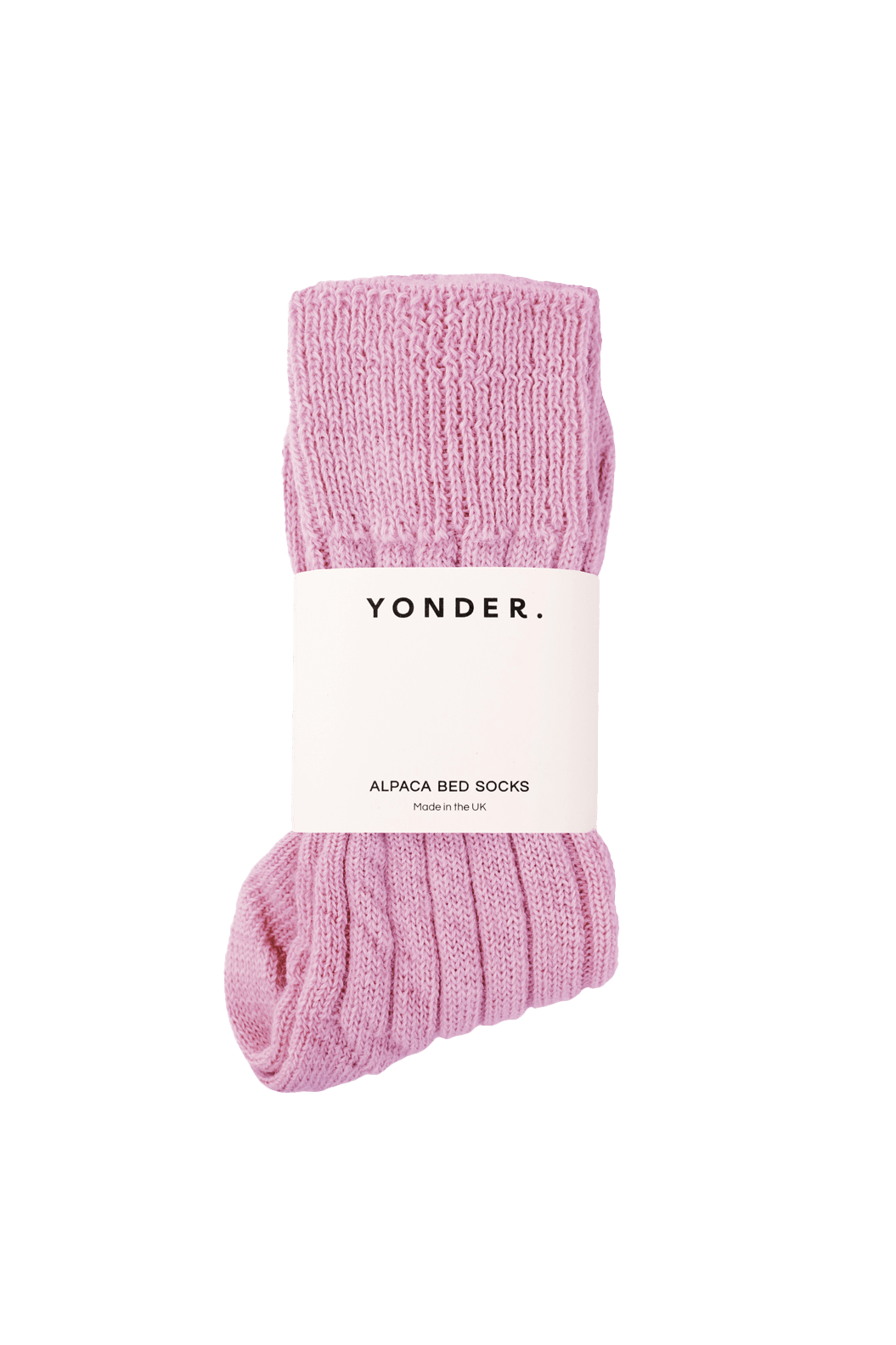 A pair of pink alpaca bed socks with a ribbed knit texture, wrapped in a white paper band labeled &