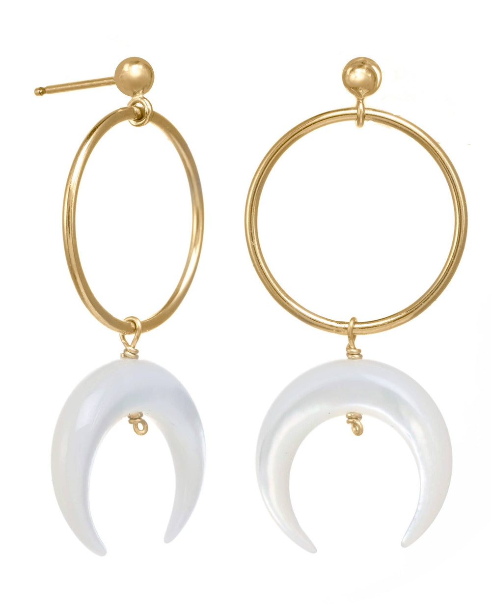 Gold hoop earrings with white crescent moon charms on a white background