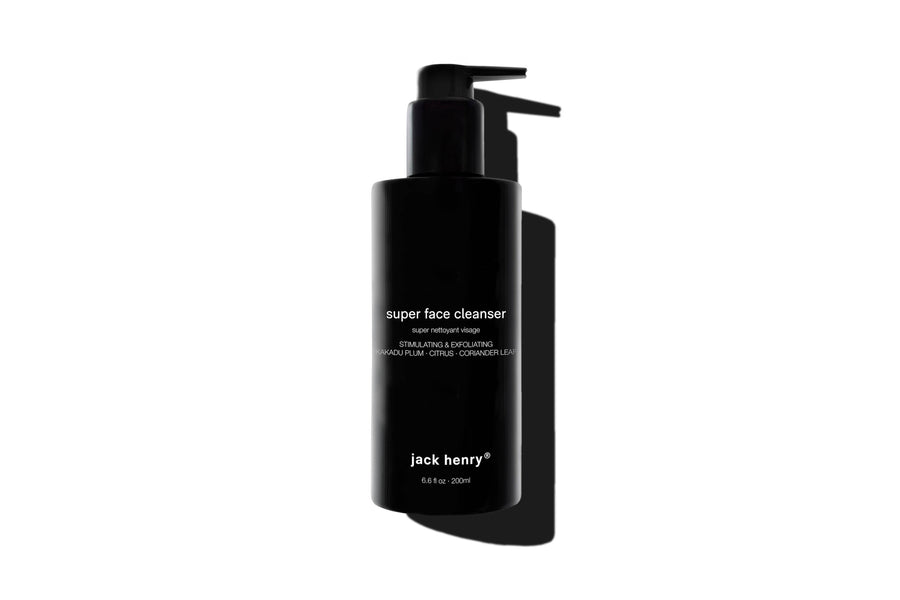 Black bottle of jack henry super face cleanser on a white background