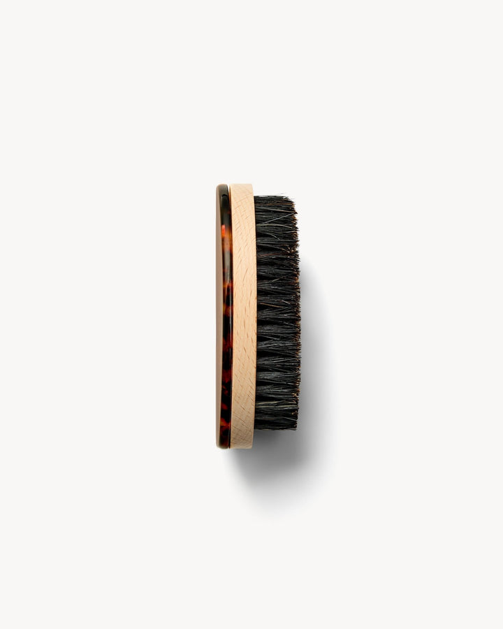 Beard Brush in Moeru Gojira on a white background
