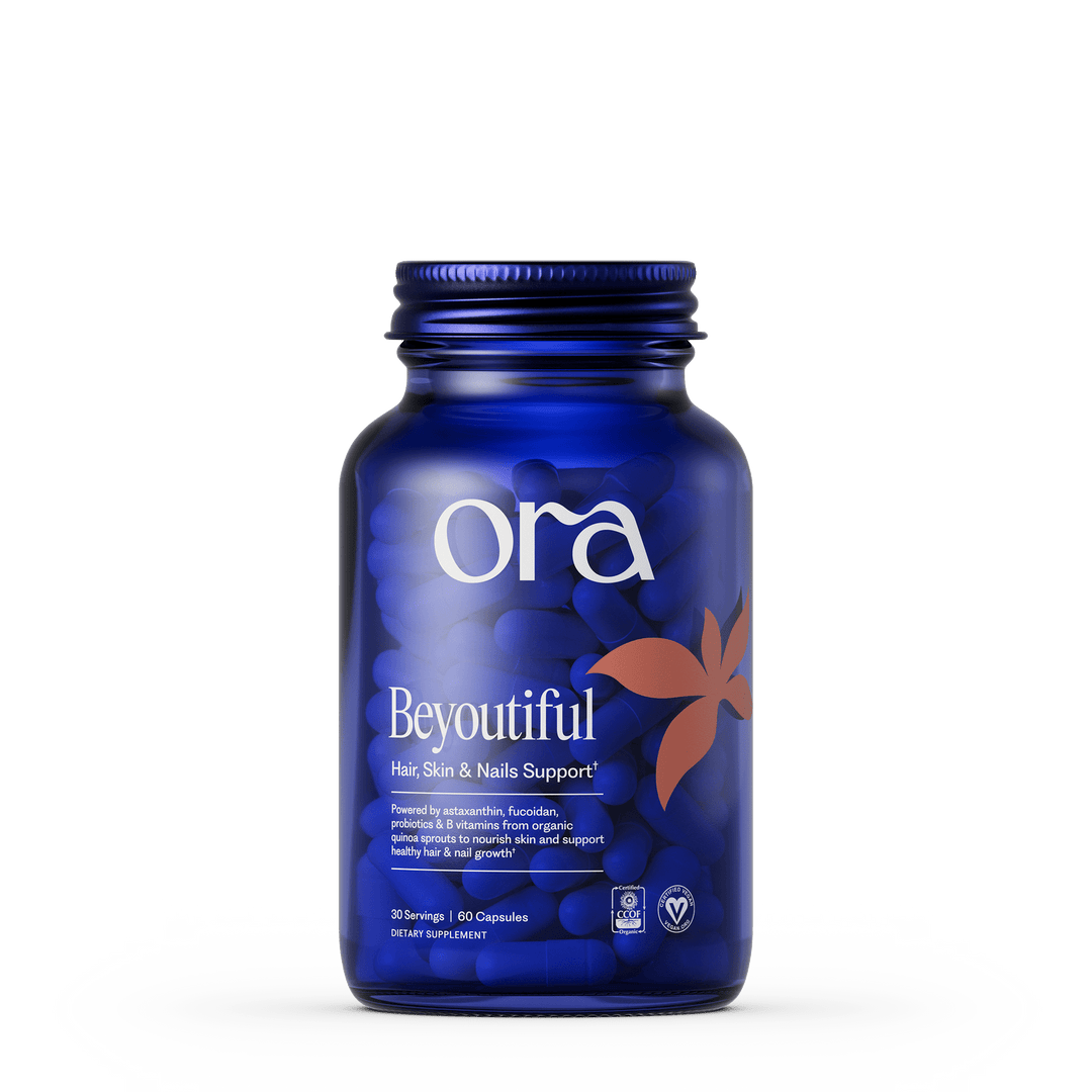 Blue bottle of Ora Beyoutiful supplement on a white background