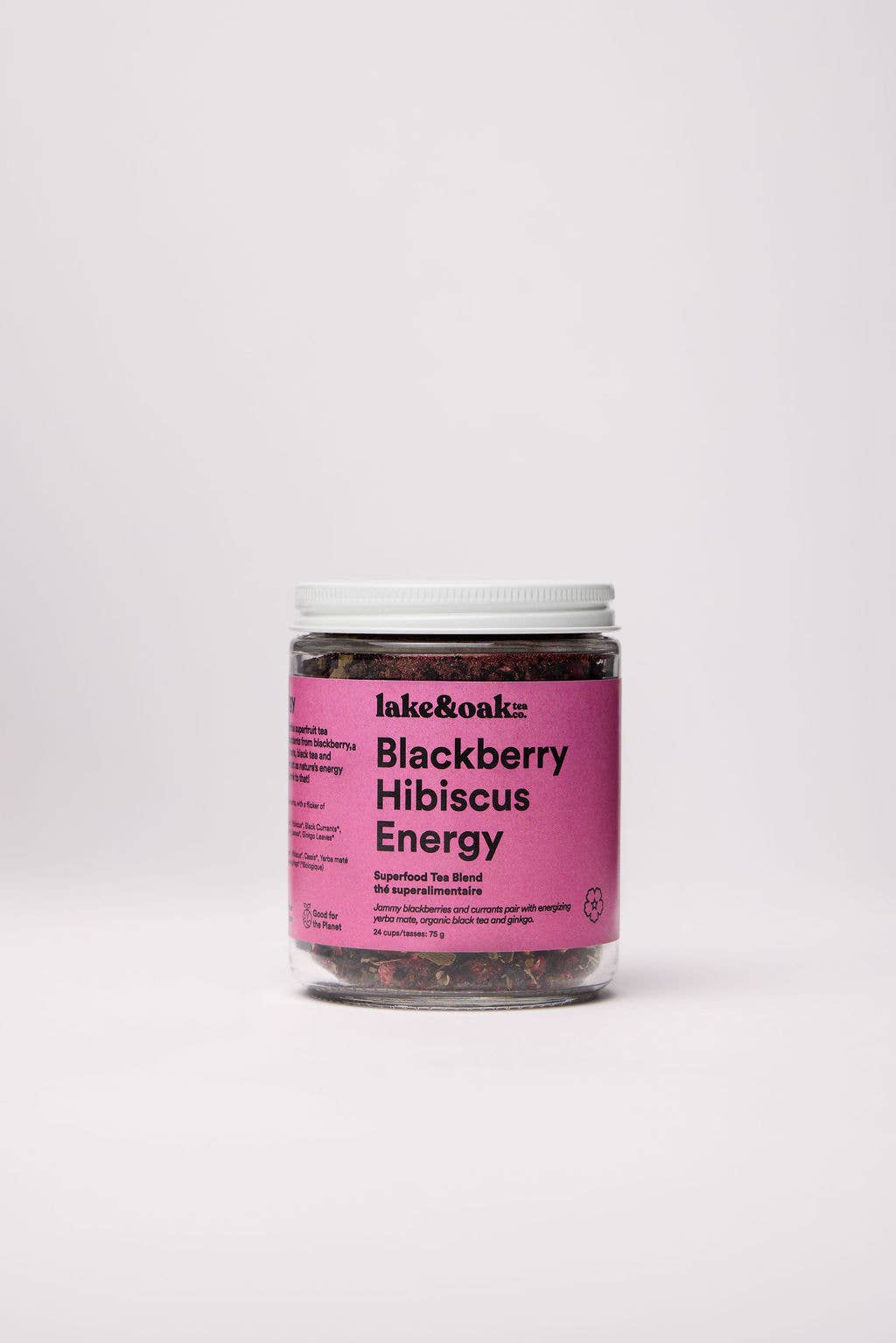 Jar of blackberry hibiscus energy tea with pink label on a white background