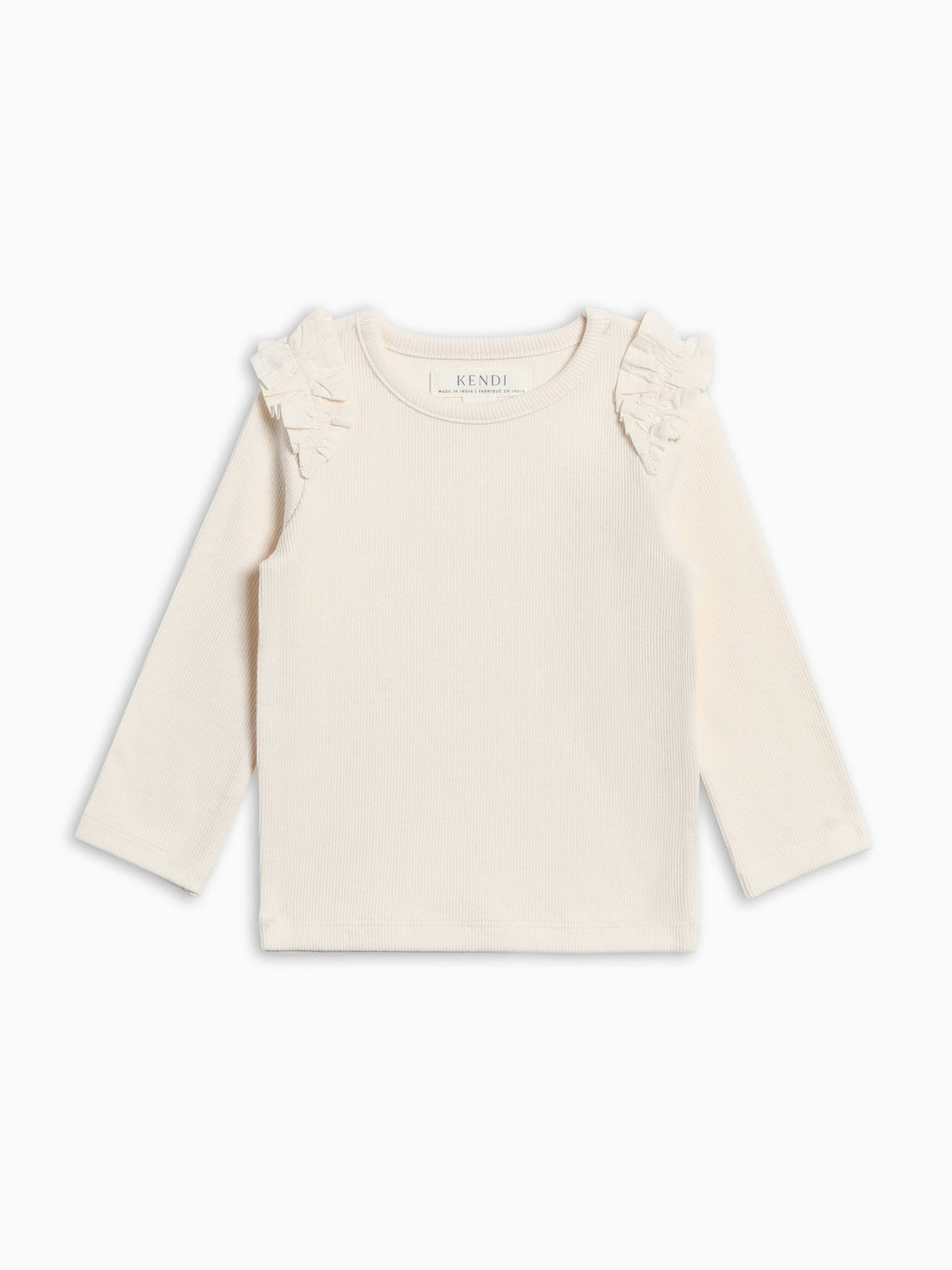 A cream-colored long-sleeve baby top with delicate ruffle details on the shoulders, displayed flat against a clean white background.