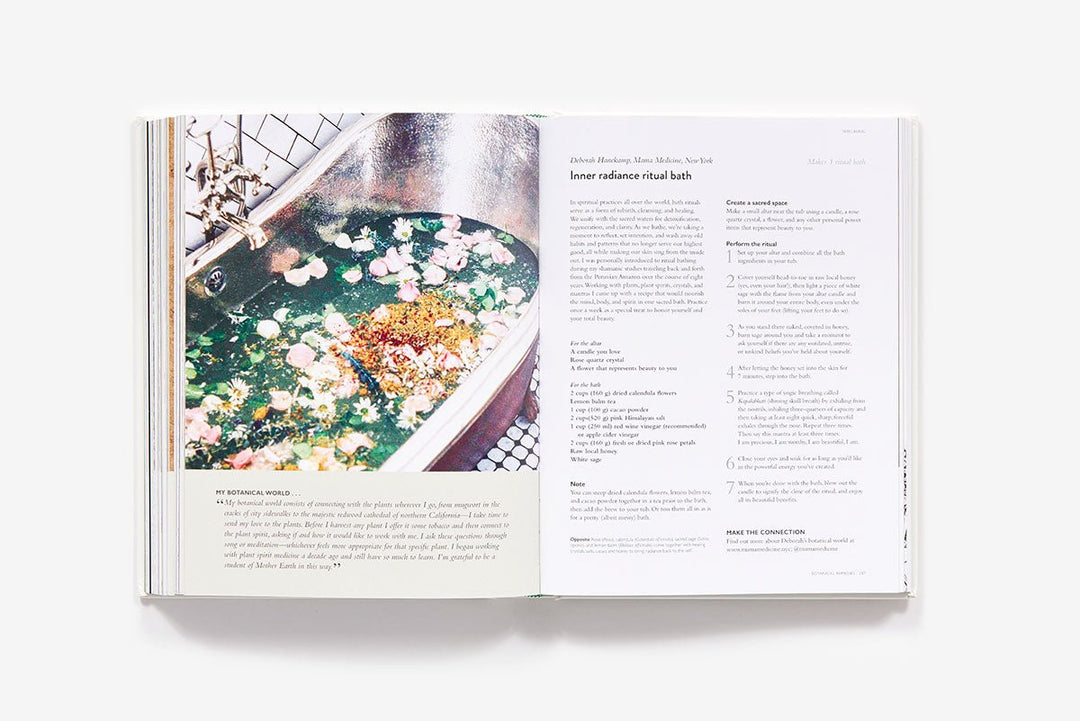 Open book showing a page with a photograph of a bathtub filled with flowers and text on a white background