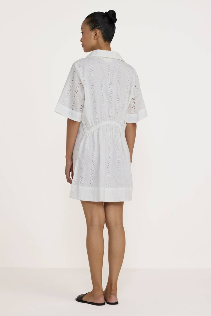 Woman wearing a Laude the Label Classic Shirt Dress in Ivory Lace on a white background