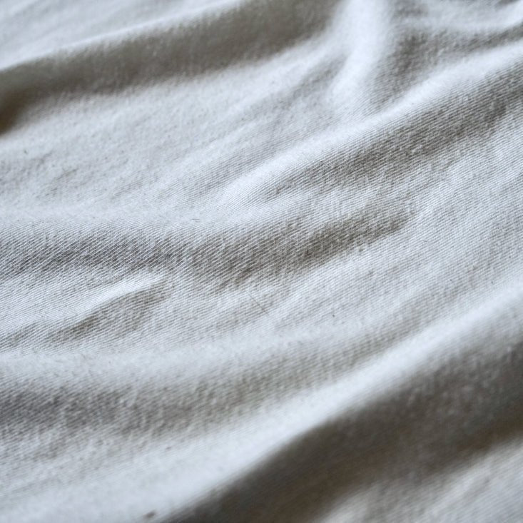 Close up of off white fabric