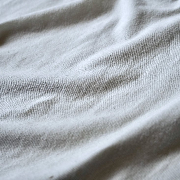 Close up of off white fabric