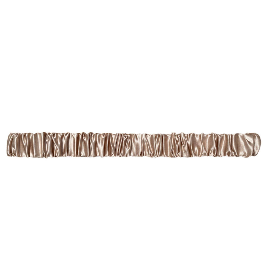 champagne silk headband on a white background.