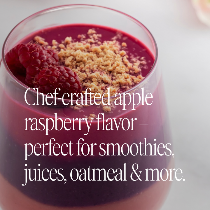 Glass of raspberry smoothie with text about chef-crafted apple raspberry flavor