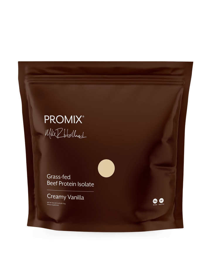 A dark brown stand-up pouch of PROMIX  Grass-fed Beef Protein Isolate in Creamy Vanilla flavor, shown on a clean white background.