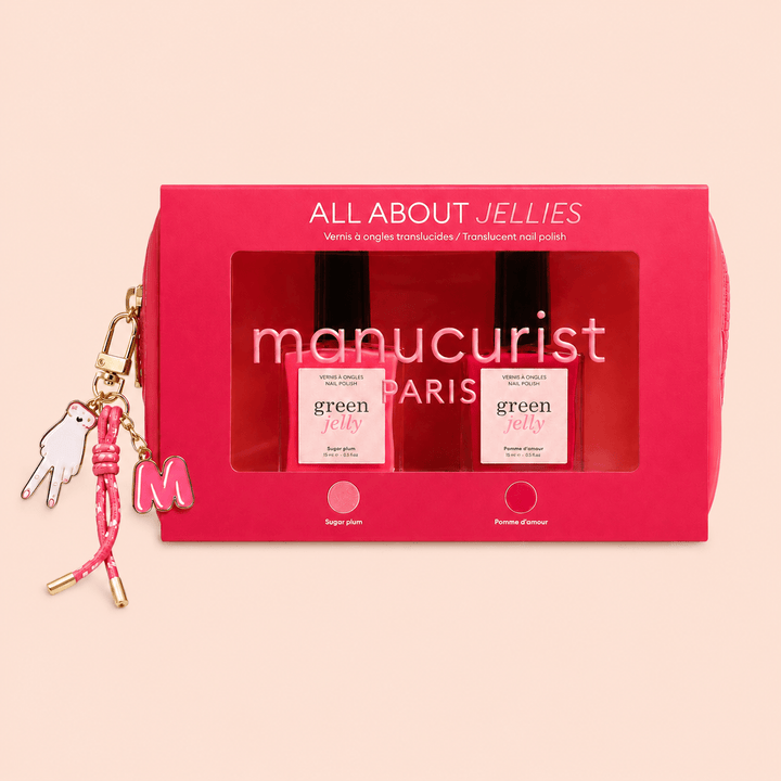 Manucurist Paris jelly nail set with pink mini bag and charms on a beige background
