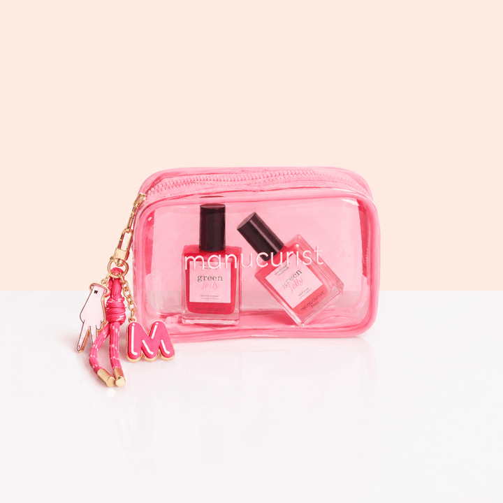 Manucurist Paris jelly nail set with pink mini bag and charms on a beige background