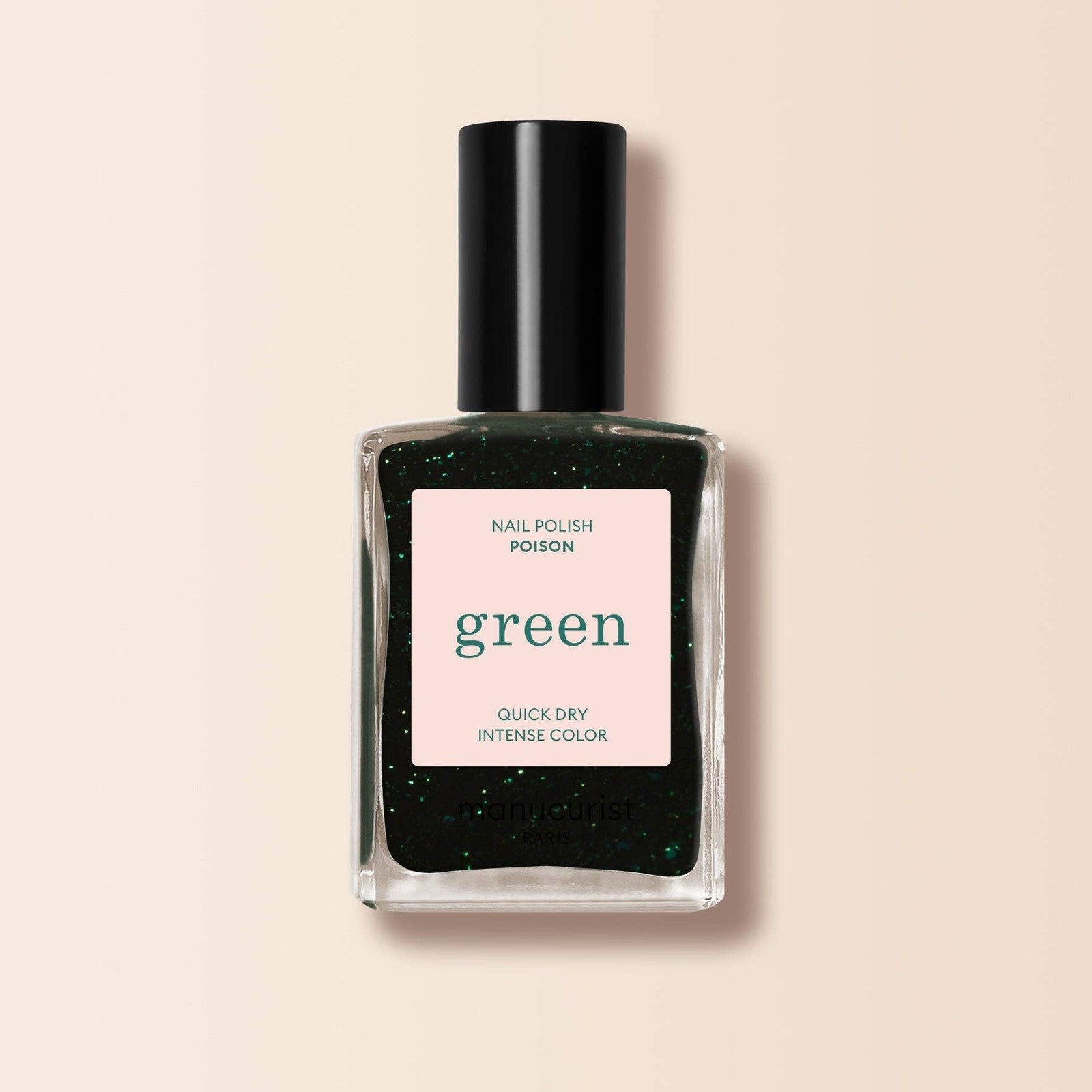 Nail polish bottle labeled 'poison' on a beige background