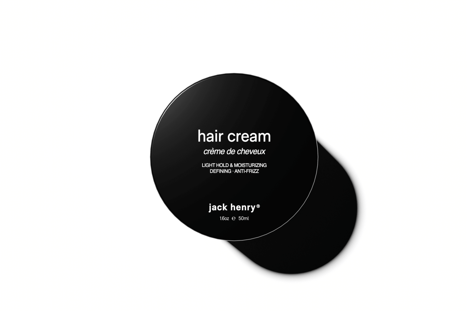 Black container of Jack Henry hair cream on a white background