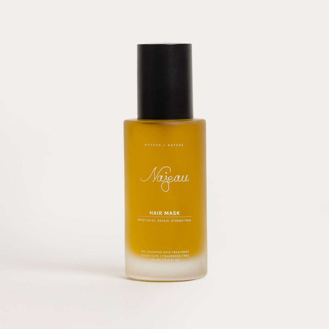 Bottle of Najeau hair mask on a light gray background