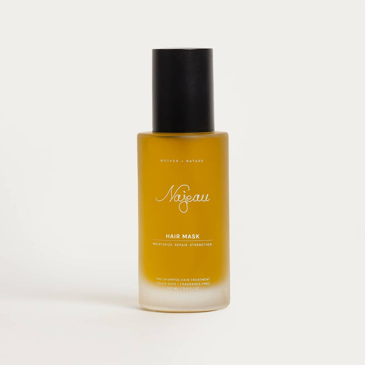 Bottle of Najeau hair mask on a light gray background