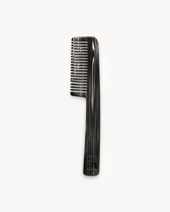 Black Pearl-patterned handle comb on a white background