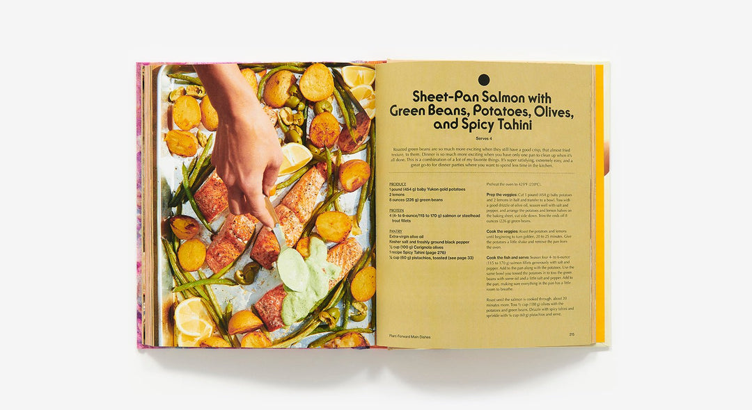 Open cookbook showing a recipe for Sheet-Pan Salmon with Vegetables