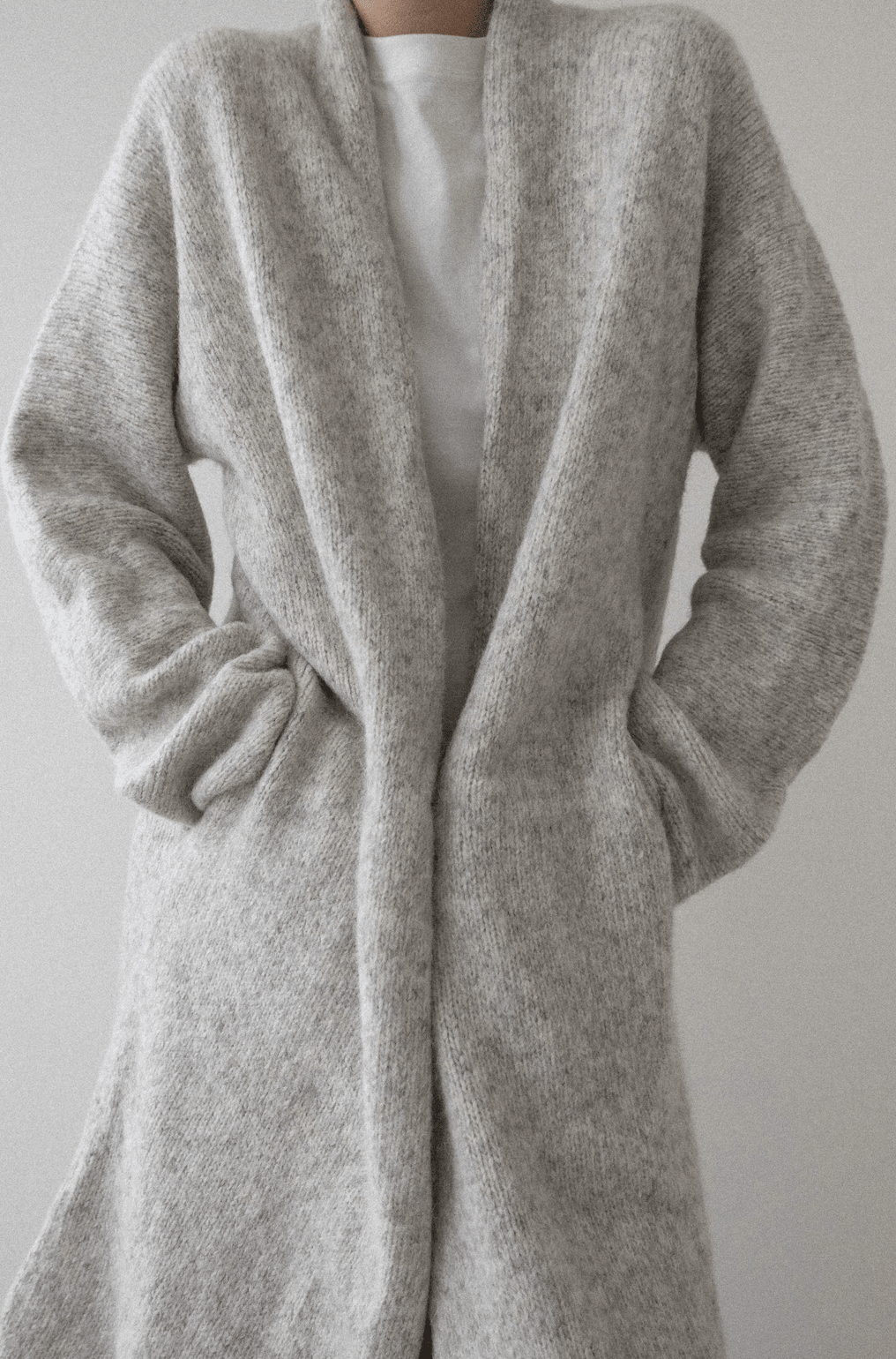 Heirloom Sweater Coat in Cloud by a person on a plain background
