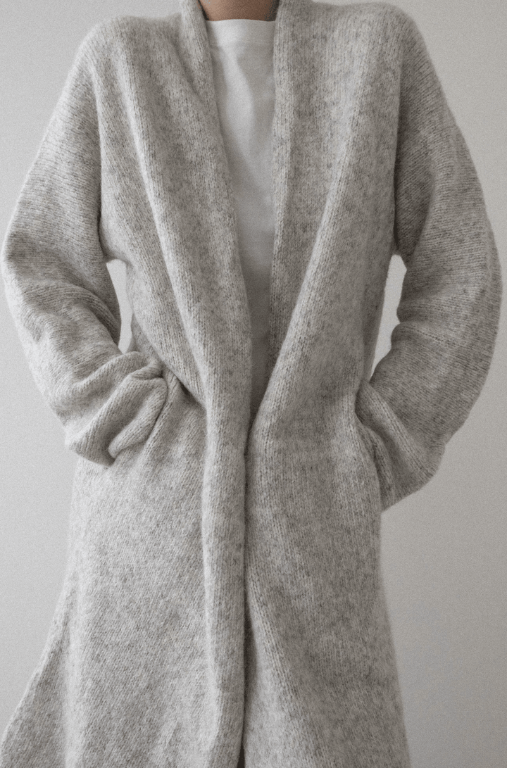 Heirloom Sweater Coat in Cloud by a person on a plain background