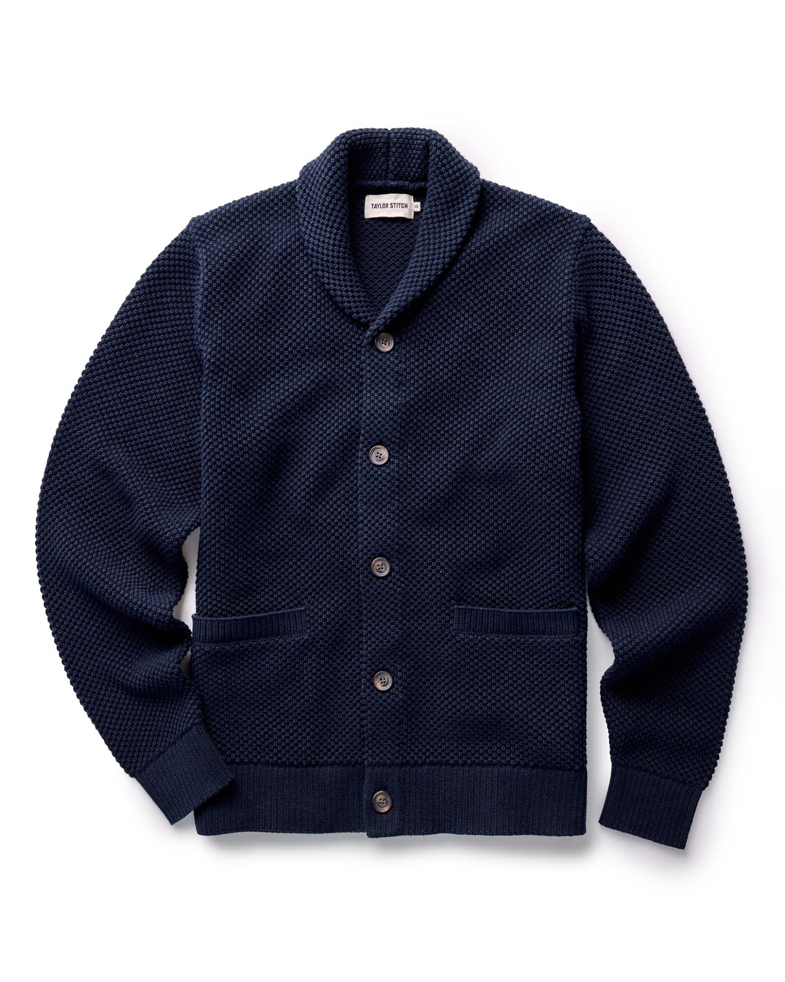The Crawford Sweater in Navy with buttons on a white background