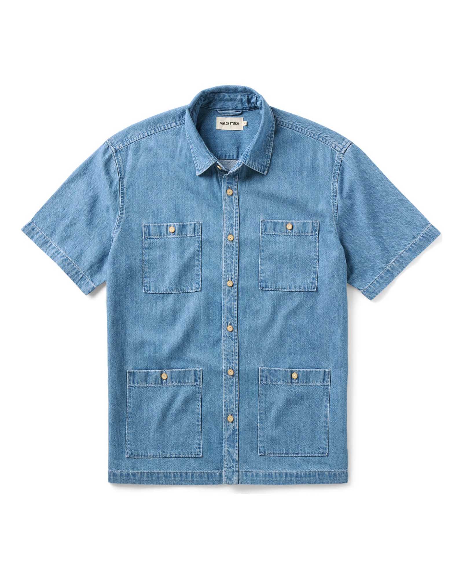 The Gulf Shirt in Washed Indigo Twill with short sleeves on a white background