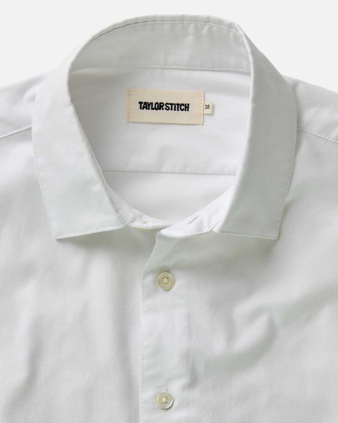 close up what dress shirt collar against white background. 