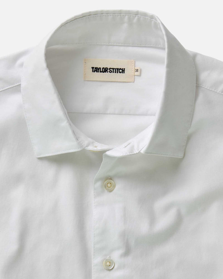 close up what dress shirt collar against white background. 