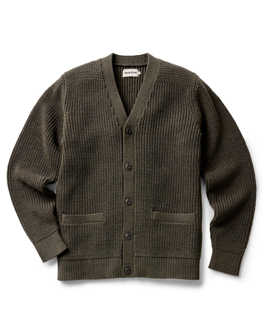 green cardigan with button details on a white background