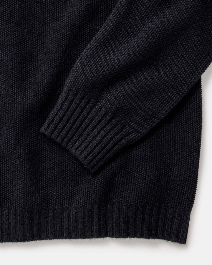 Close-up of a midnight sweater on a white background