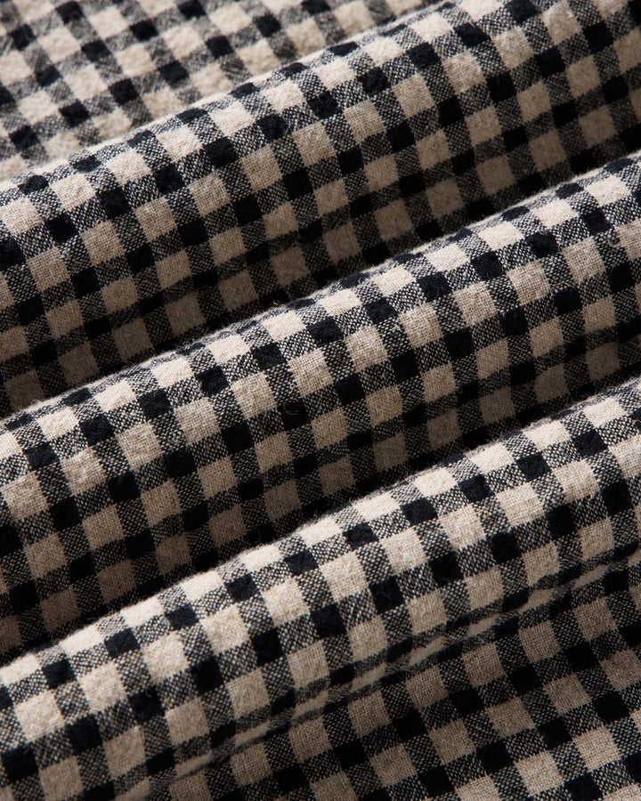 A close-up of breaker ginham fabric.