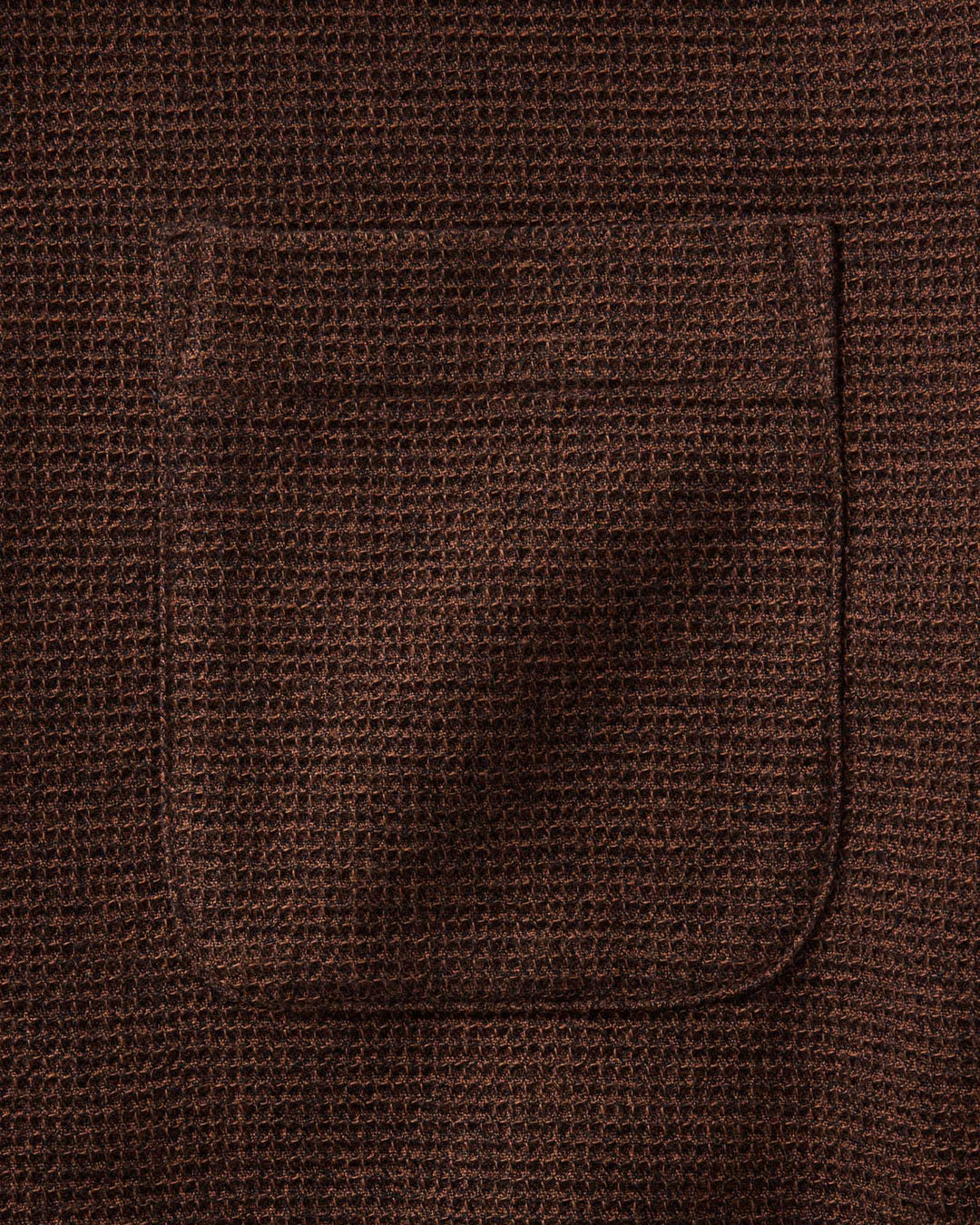 Close-up of The Jack Shirt in Timber Twist Waffle-knit fabric with a single front patch pocket.
