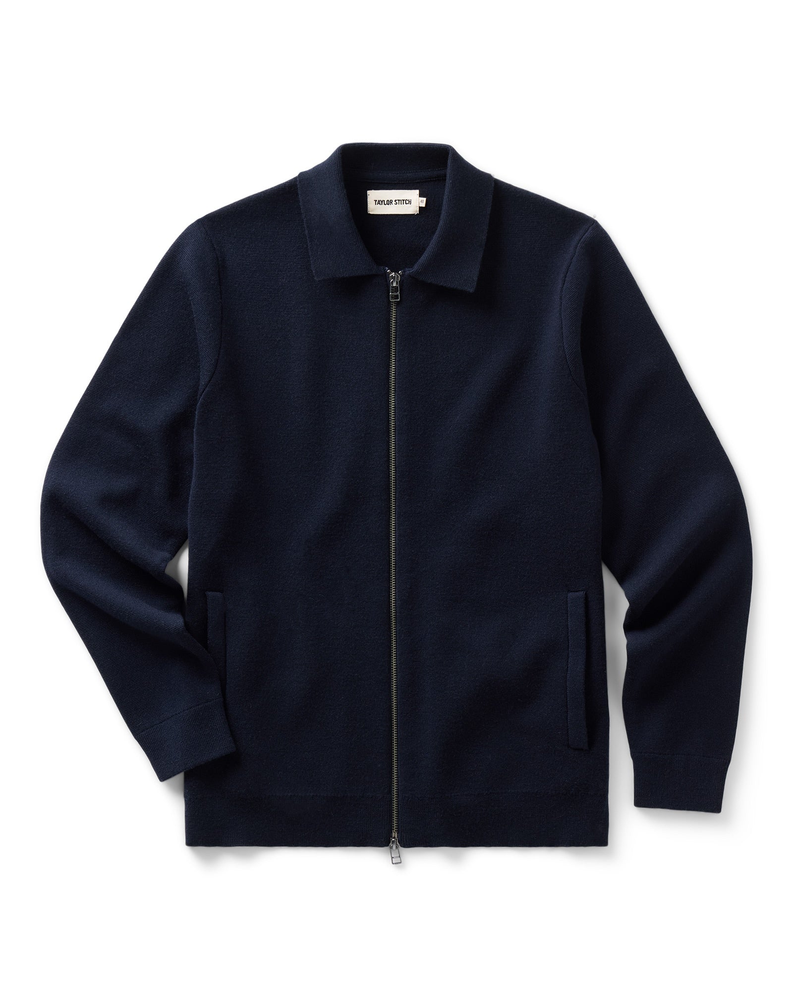 Taylor Stitch's Portola Sweater Jacket in Midnight Merino, displayed flat against a clean white background.